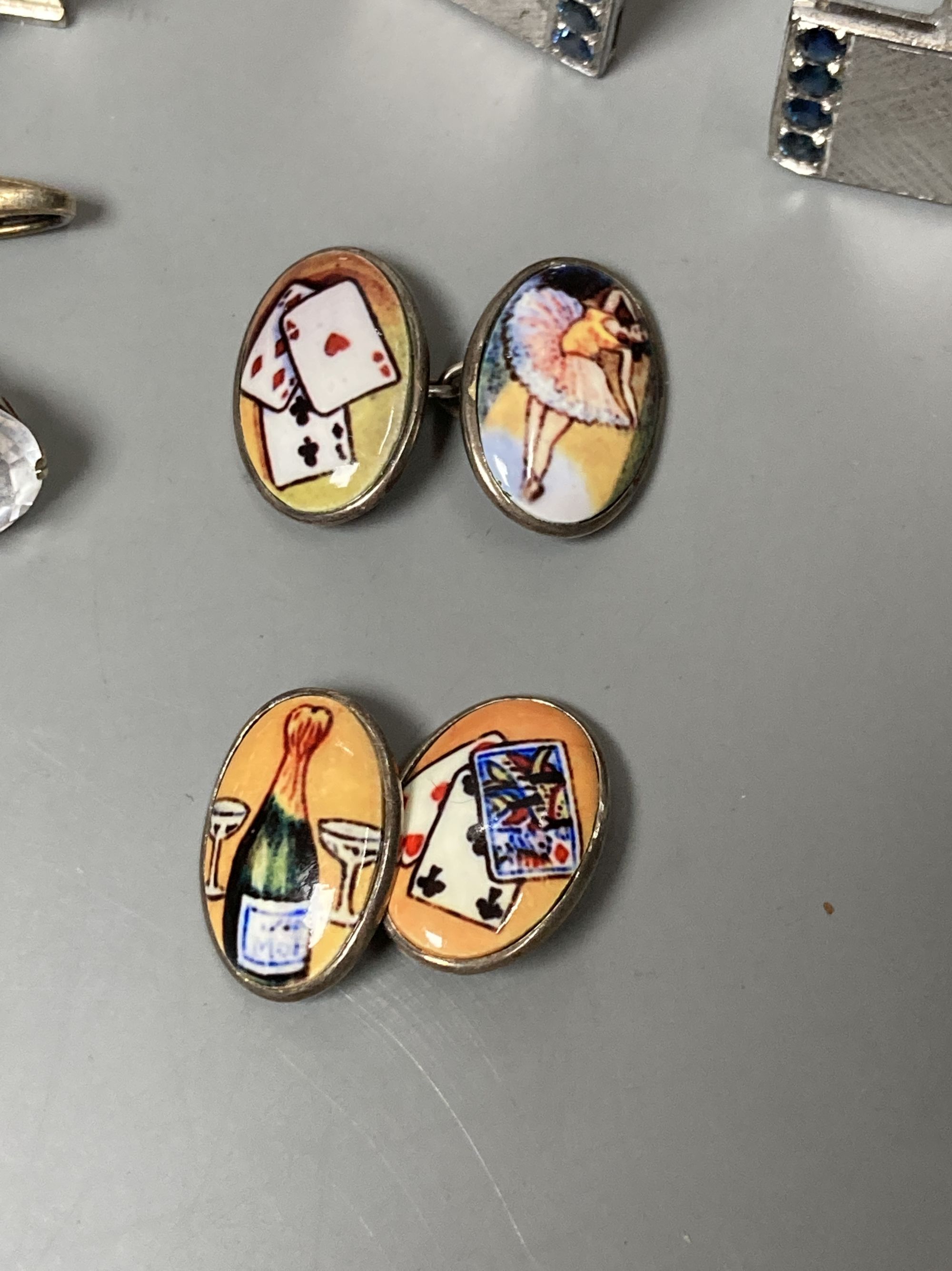 Five assorted pairs of white metal cufflinks